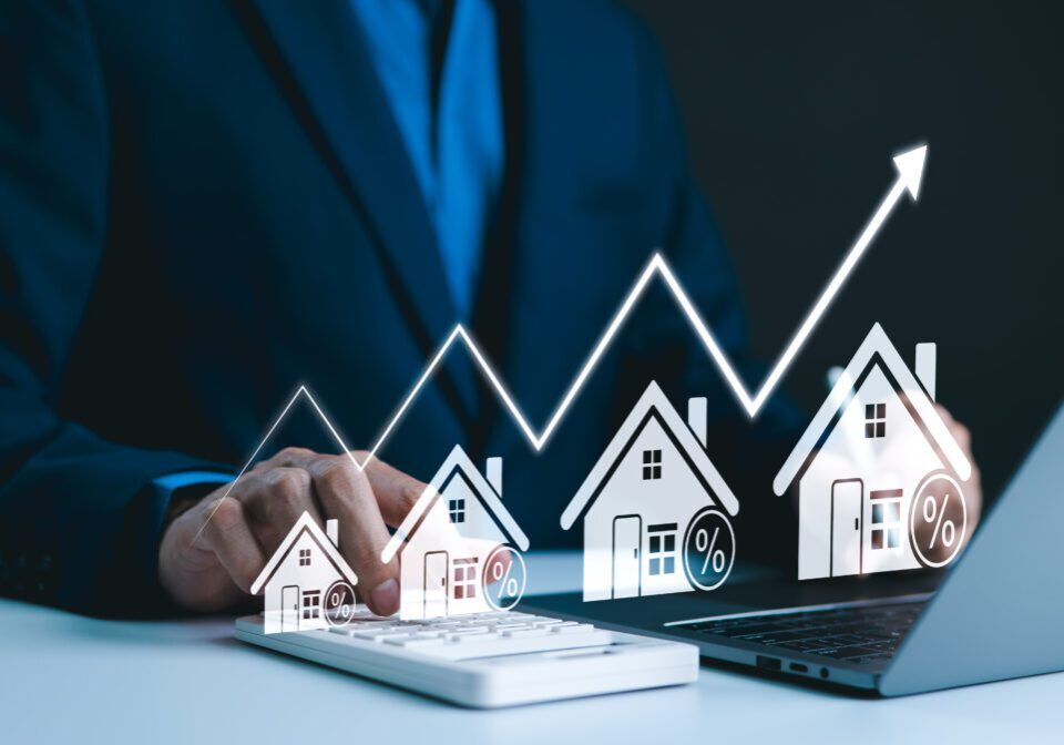 Real estate market growth chart with houses.